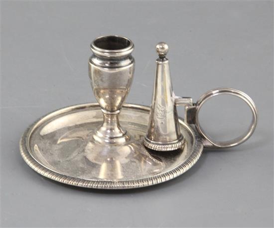 A George III silver circular chamberstick by William Bateman, 107 grams.